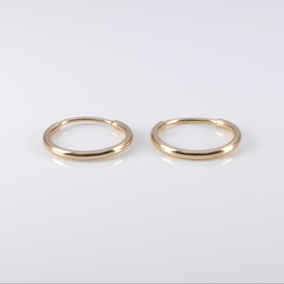 Solid 14k yellow gold small hoop earrings .3 grams - Picture 2 of 7